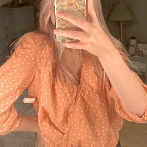 pink stared wrap around shirt